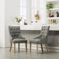 Sedie con schienale ad ala imbottite con borchie argentate in legno massello Roundhill Furniture (Set di 2)