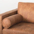 Divano a tre posti Loretta in similpelle color cognac con cuscini a rullo - 87.9L x 36.2P x 33.8A